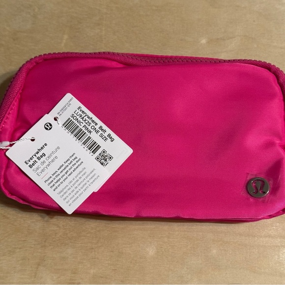 lululemon athletica Handbags - NWT Lululemon Everywhere Belt Bag 1L Sonic Pink Logo Strap